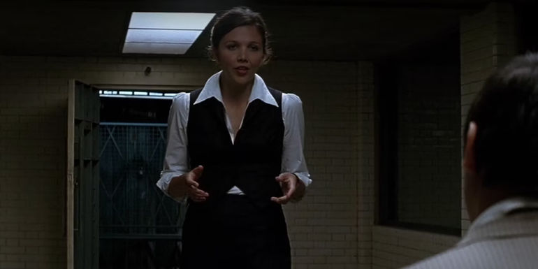 Rachel Dawes interrogating thugs in The Dark Kngiht