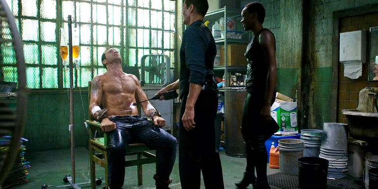 Wo Fat and an associate torture Steve Mary smiling with Steve (Alex O'Loughlin) in Hawaii Five-0