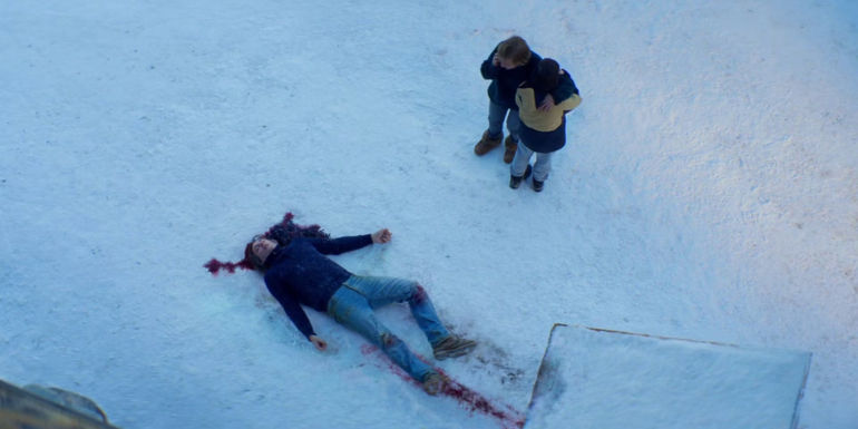 A body outside of a shed in the snow in Anatomy of a Fall