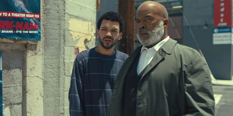 Justice Smith & David Alan Gier standing on sidewalk in The American Society of Magical Negroes