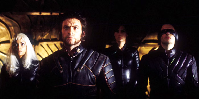 Storm, Wolverine, Jean Grey, and Cyclops as the X-Men team in 2000's X-Men