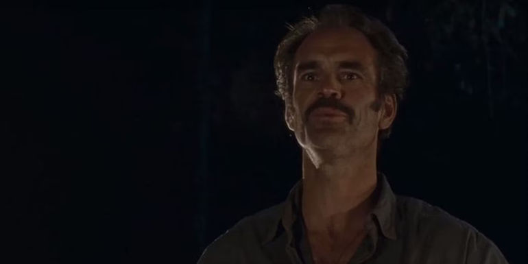 Simon looking at something on The Walking Dead.