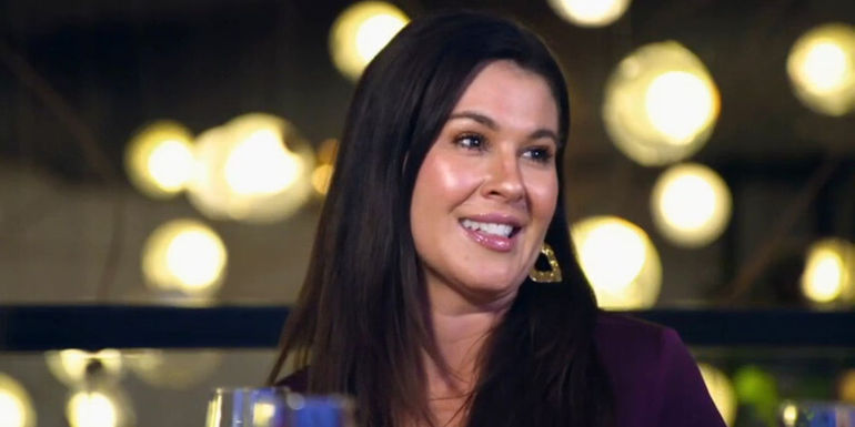 Chloe Brown from Married at First Sight Season 17 in purple top talking to her friend