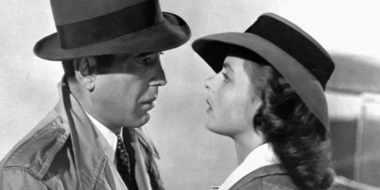 Humphrey Bogart and Ingrid Bergman looking at each other in Casablance