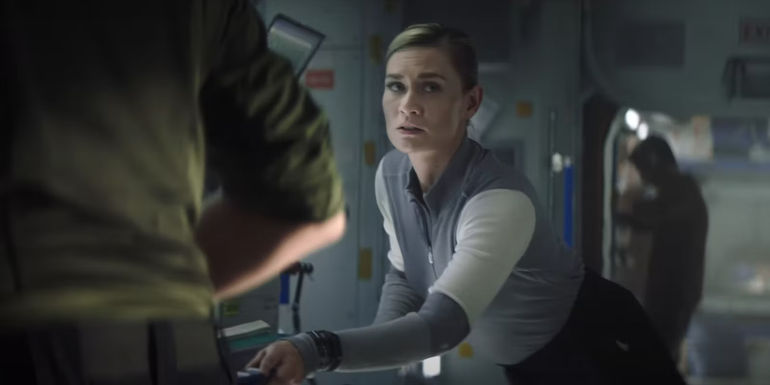 Nika looks worried while leaning over in I.S.S.