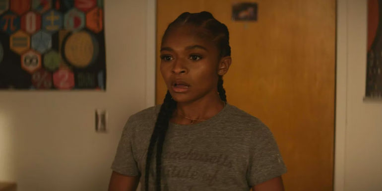Riri Williams (Dominique Thorne) in her dorm room in Black Panther Wakanda Forever