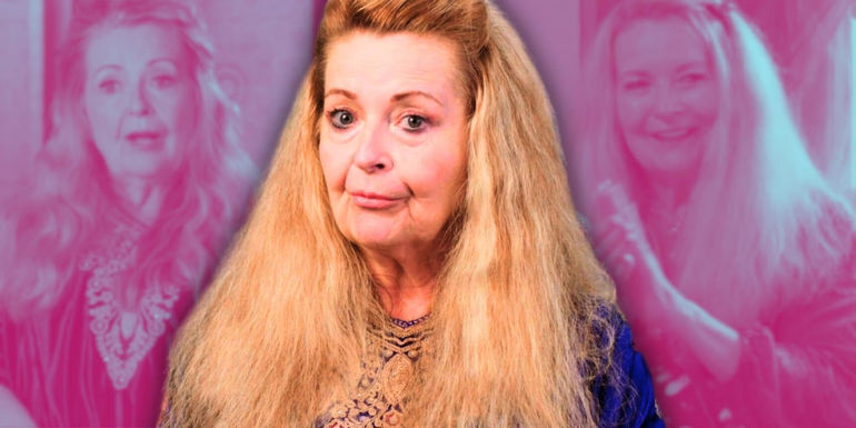 90 Day Fiance's Debbie Aguero wearing purple dress with her long hair left open and sporting a scared expression 