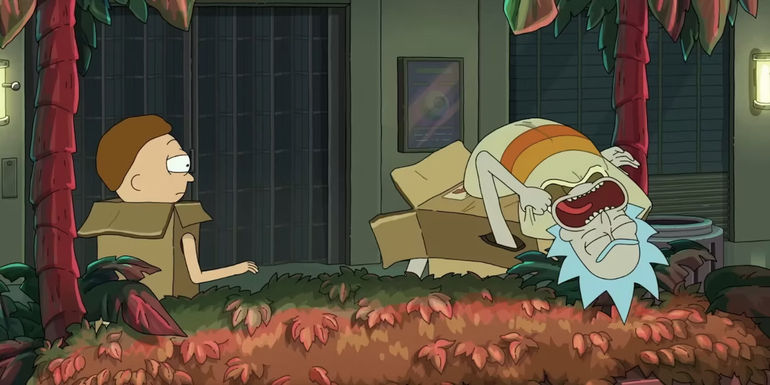 Rick is bit by a sentient T shirt as Morty looks on in Rick and Morty season 7