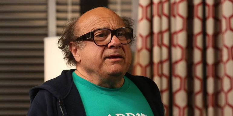 Frank in a hoodie and green shirt in It's Always Sunny in Philadelphia