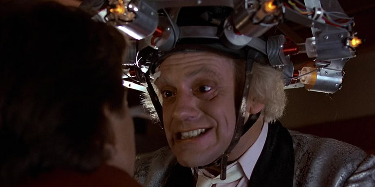 Doc Brown wearing a science contraption on his head in Back to the Future