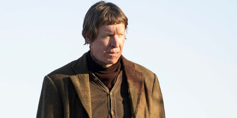 Ole Munch looking off-screen in Fargo season 5