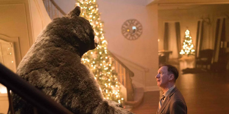 Varga stares at a stuffed bear in Fargo