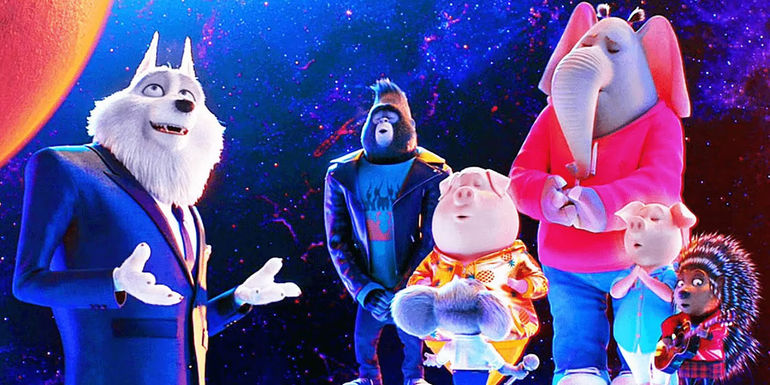 Jimmy with the cast on stage in Sing 2-1