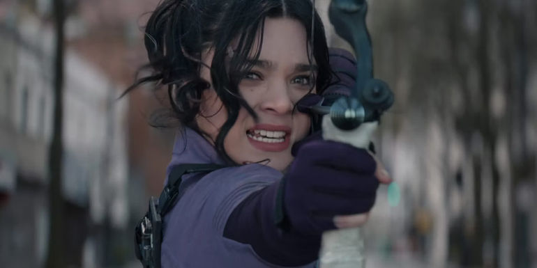 Kate Bishop (Hailee Steinfeld) pointing a bow and arrow at the screen in Hawkeye