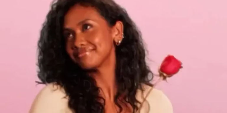 The Bachelor Season 28 Contestant Rachel Nance Posing With A Rose