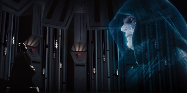 Vader looking at Palpatine's hologram in The Empire Strikes Back