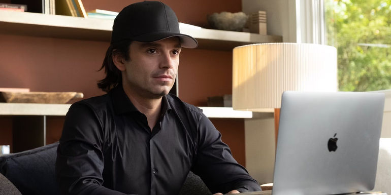 Sebastian Stan sits behind a computer in Dumb Money 