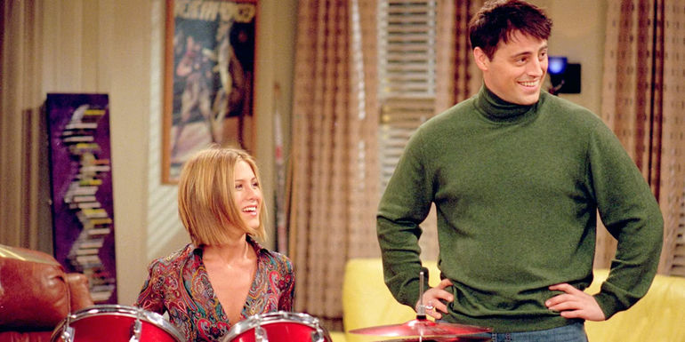Matt LeBlanc As Joey And Jennifer Aniston As Rachel by a drum set in Friends