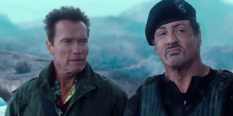 Arnold Schwarzenegger as Trench Mauser and Sylvester Stallone as Barney Ross in The Expendables 2.