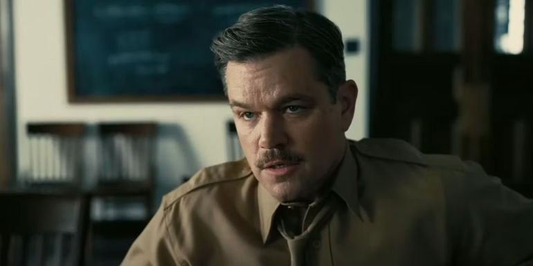 Matt Damon as Leslie Groves looking serious in Oppenheimer.