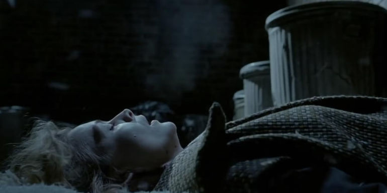 Selina Kyle lying on the ground in Batman Returns