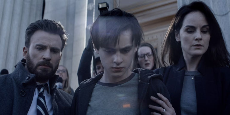 Chris Evans Jaeden Martell and Michelle Dockery in Defending Jacob Apple TV+