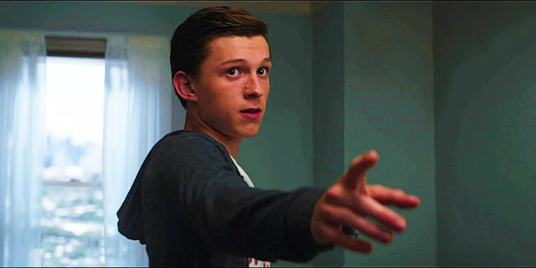 Tom Holland's Spider-Man extending hand out after using powers in Captain America Civil War