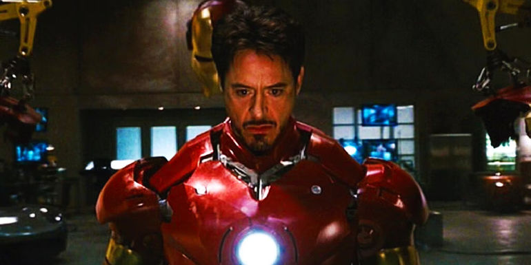Tony Stark suiting up as Iron Man in Iron Man