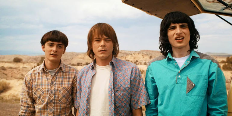 Will (Noah Schnapp), Jonathan (Charlie Heaton), and Mike (Finn Wolfhard) in Stranger Things season 4