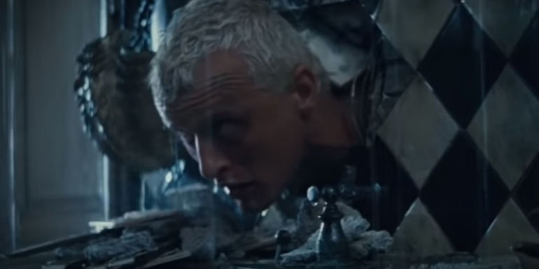 Roy with his head through a wall in Blade Runner