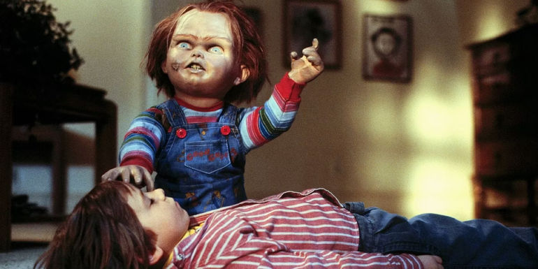 Chucky casts a spell on Alex Vincent as an unconscious Andy in Child's Play