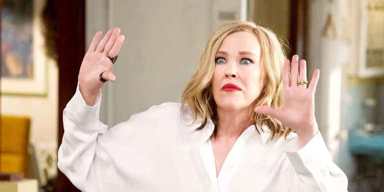 Catherine O'Hara, as Moira Rose, poses in Schitt's Creek