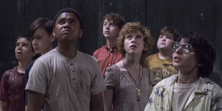 The Losers Club searching the sewers for Pennywise in It.