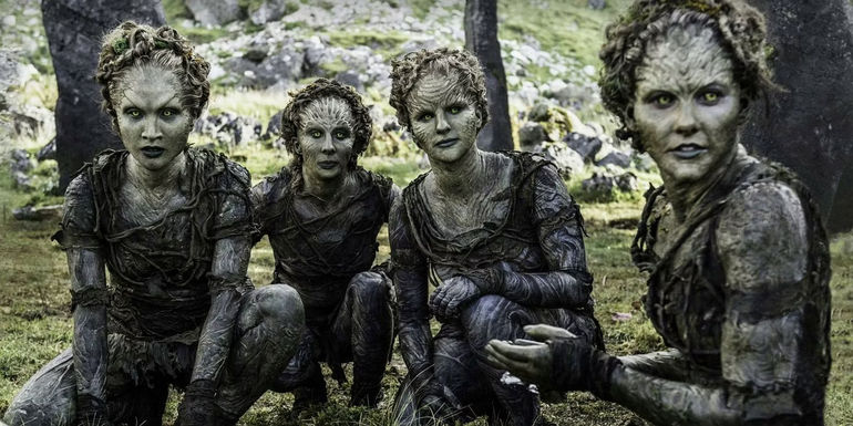 The Children of the Forest kneeling down and looking in the same direction in Game of Thrones.