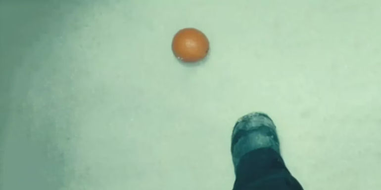 Orange rolling on the ground in True Detective