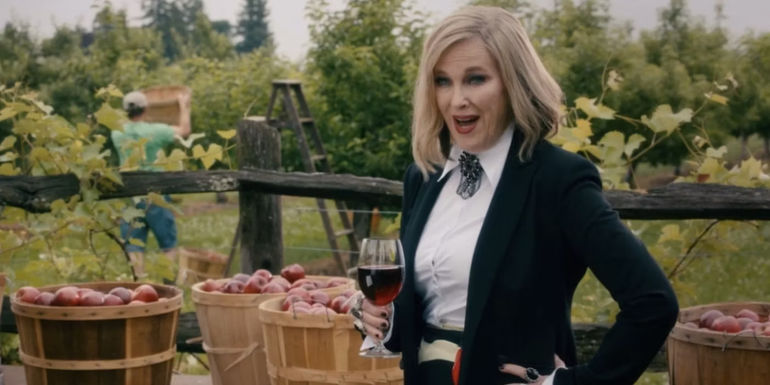 Moira films a wine commercial at a vineyard in Schitt's Creek.