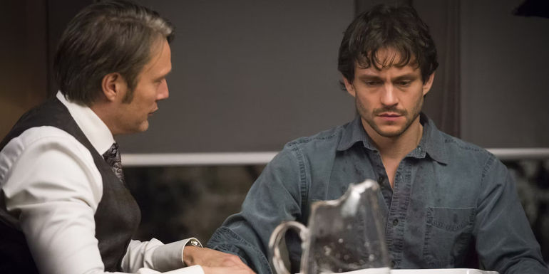 Wil sitting at a table with Hannibal.