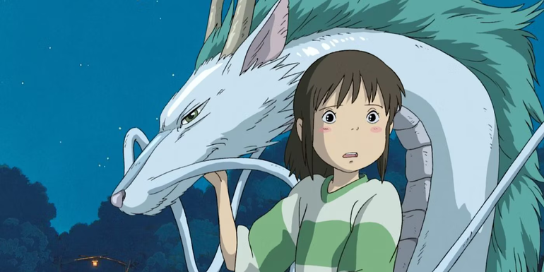 Chihiro is holding onto Haku's face in Spirited Away. 