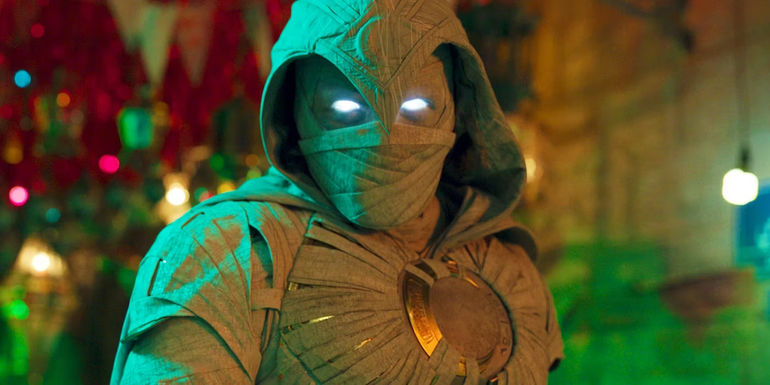 Moon Knight (Oscar Isaac) looks ahead at the viewer in Moon Knight