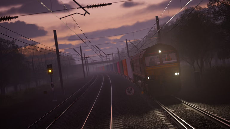 Train Sim World 4 Steam screenshot 6 colorful cargo train driving at night