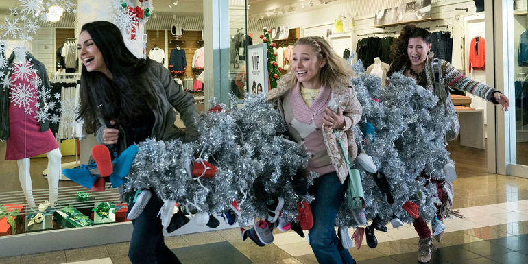 Amy (Mila Kunis), Kiki (Kristen Bell), and Carla (Kathryn Hahn) stealing a Christmas Tree in A Bad Moms Christmas.