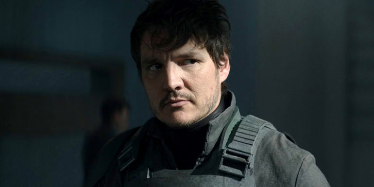 Pedro Pascal's Din Djarin helmet-less in the Imperial mess hall on Morak