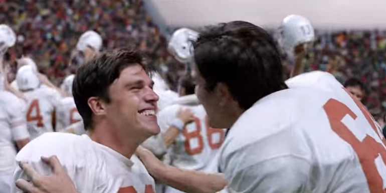 Rett Terrell as Bobby Mitchell and Finn Wittrock as Freddie Steinmark in My All American.