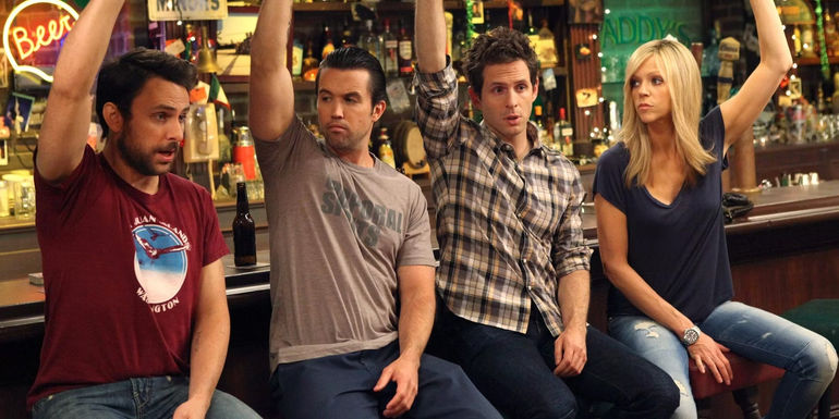 The Gang with their hands raised in It's Always Sunny In Philadelphia 
