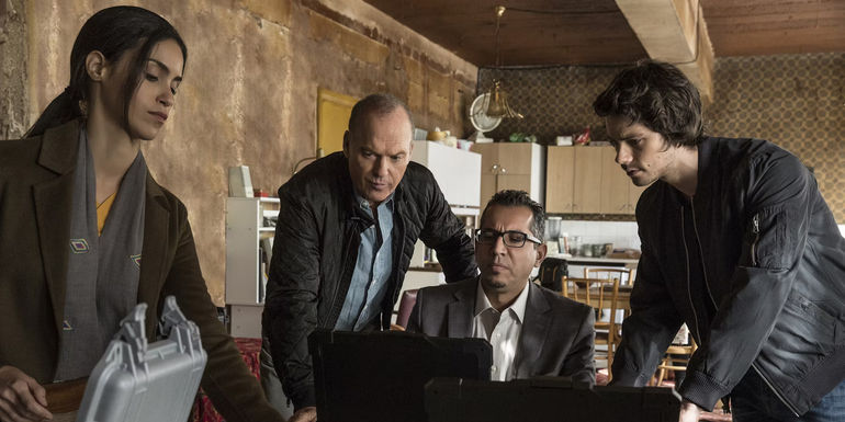 American Assassin, Dylan O'Brien Michael Keaton looking at a computer