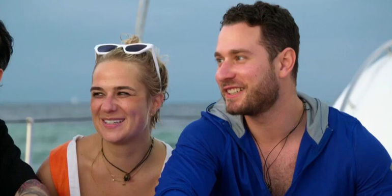 Emily and Brennan Married At first Sight season 17 sitting next to eachother laughing