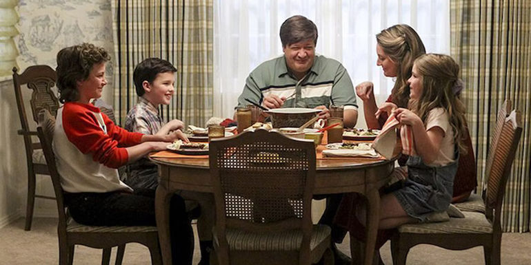 George Cooper wating with with his family on Young Sheldon
