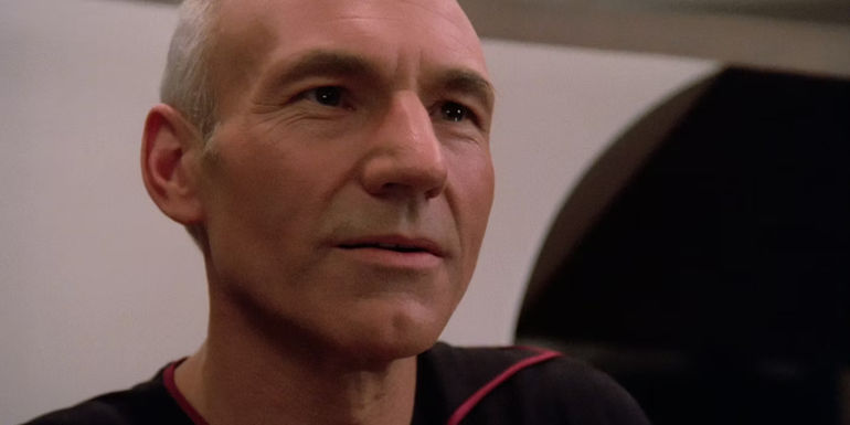 Patrick Stewart as Captain Jean-Luc Picard looking curious in Star Trek: The Next Generation