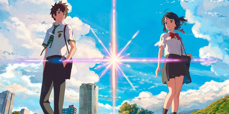 Your Name. Mitsuha and Taki in their respective school uniforms, separated by a falling star