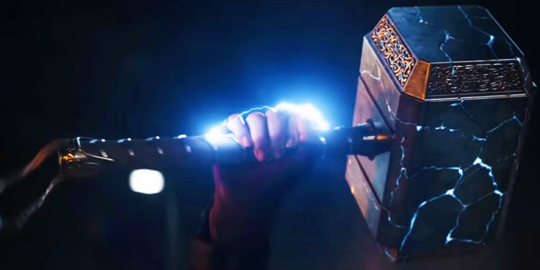 The Mighty Thor holding Mjolnir in Thor Love and Thunder